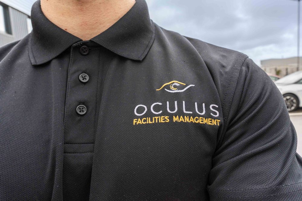 An Oculus FM team member in a branded shirt.